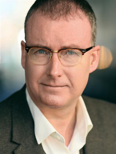 SIMON CARTWRIGHT with glasses